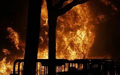 A fire set by demonstrators protesting a scheduled speaking appearance by Breitbart News editor Milo Yiannopoulos burns on Sproul Plaza on the University of California at Berkeley campus on Wednesday, Feb. 1, 2017, in Berkeley, Calif.  (AP/Ben Margot)