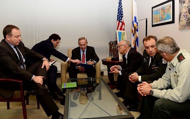Prime Minister Benjamin Netanyahu (center) and his advisers meet ahead of his meeting with US President Donald Trump, on February 14, 2017. (Avi Ohayun/Prime Minister's Office)