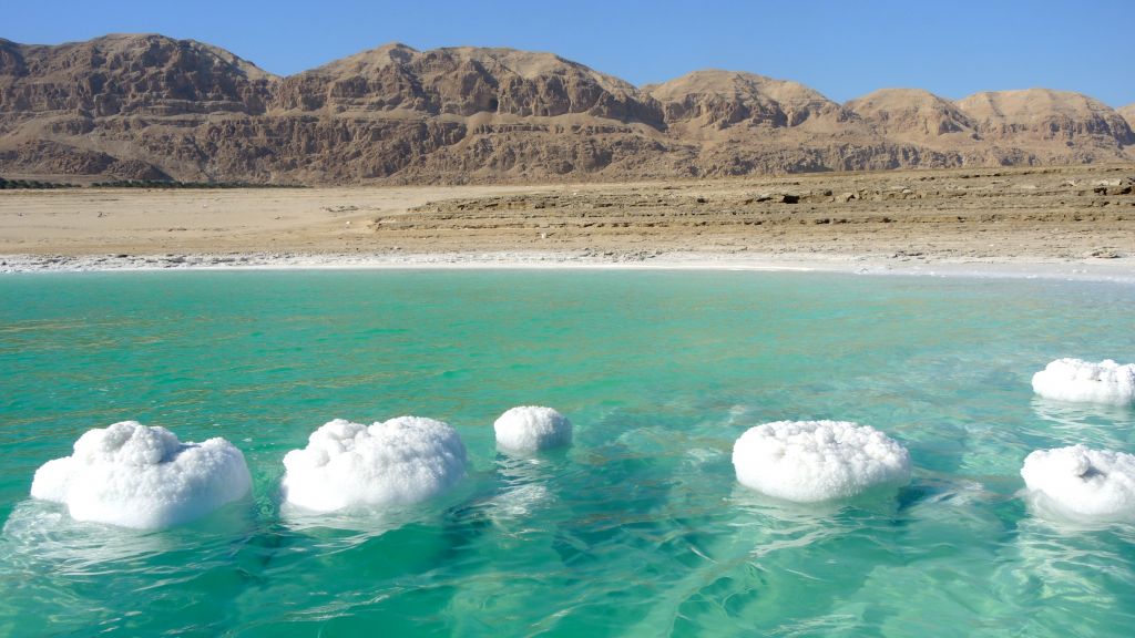 As the water level drops, scientists discovered "salt chimneys," salt formations that grew around underground freshwater springs. They are unsure why the salt crystalizes around the streams of freshwater, like these pictured on January 11, 2017. (Melanie Lidman/Times of Israel)