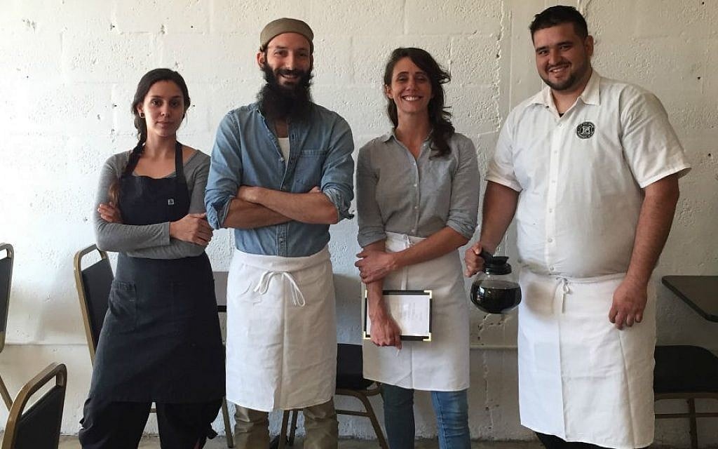 The staff at Zak the Baker’s new kosher deli in Miami, from left to right: chef Melissa Sosa, Zak Stern, general manager Ashley Dugdale and server Ricardo Araujo. (Courtesy of Zak the Baker/via JTA) The staff at Zak the Baker’s new kosher deli in Miami, from left to right: chef Melissa Sosa, Zak Stern, general manager Ashley Dugdale and server Ricardo Araujo. (Courtesy of Zak the Baker/via JTA)
