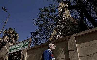 A Christian man who fled el-Arish stands outside the Evangelical Church in Ismailia, 120 kilometers (75 miles) east of Cairo, Egypt, Sunday, Feb. 26, 2017. Egyptian Christians fearing attacks by Islamic State militants are fleeing the volatile northern part of the Sinai Peninsula for a fourth day, after a string of sectarian killings there sent hundreds fleeing and raised accusations the government is failing to protect the minority. (AP Photo/Nariman El-Mofty)