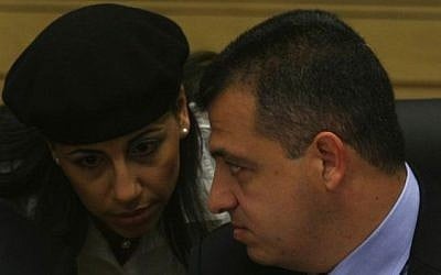 Perach Lerner, adviser to Prime Minister Benjamin Netanyahu (L), speaks with then-Likud MK Carmel Shama-Hacohen in the Knesset on July 25, 2011 (Kobi Gideon / Flash90)