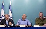 From left, Prime Minister Benjamin Netanyahu, former defense minister Moshe Ya'alon and former IDF chief of staff Benny Gantz speak at a press conference at the Prime Minister Office, following Operation Protective Edge, on August 27, 2014. (Yonatan Sindel/Flash90)