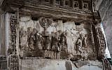 A depiction of Jewish captives and the gold menorah taken from Jerusalem following the destruction of the city in 70 CE, seen on the Arch of Titus, in Rome, Italy, October 20, 2016. (Yossi Zamir/Flash90)