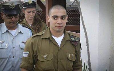 IDF Sgt. Elor Azaria arrives for a  court hearing at the Kirya military base in Tel Aviv, on January 24, 2017. (Flash90)