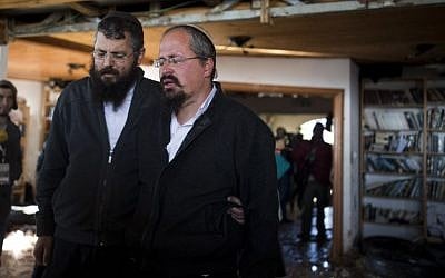 Rabbi Yair Frank leaving the Amona outpost synagogue after a standoff with police, February 2, 2017. (Yonatan Sindel/Flash90)