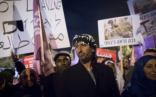 Israeli Jews and Arabs attend a protest against Bedouin home demolitions in Tel Aviv on February 4, 2017. (Photo by Miriam Alster/FLASH90) Israeli Jews and Arabs attend a protest against Bedouin home demolitions in Tel Aviv on February 4, 2017. (Photo by Miriam Alster/FLASH90)