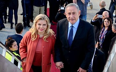 Prime Minister Benjamin Netanyahu and his wife Sara depart to the United States to meet with President Donald Trump, on February 13, 2017. (Avi Ohayon/GPO)