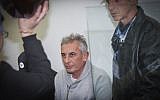 Kfar Saba Mayor Yehuda Ben-Hamo appears at a remand hearing at Rishon Lezion Magistrate's Court on February 13, 2017, after he was arrested for suspected corruption. (Flash90)