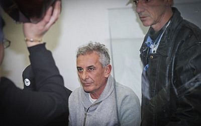 Kfar Saba Mayor Yehuda Ben-Hamo appears at a remand hearing at Rishon Lezion Magistrate's Court on February 13, 2017, after he was arrested for suspected corruption. (Flash90)
