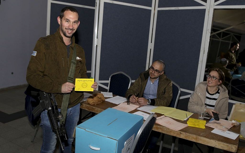 A local resident casts his vote in the elections for the mayor of Gush Etzion Regional Council, at a polling station in the settlement of Alon Shvut on February 14, 2017. (Photo by Gershon Elinson/Flash90) A local resident casts his vote in the elections for the mayor of Gush Etzion Regional Council, at a polling station in the settlement of Alon Shvut on February 14, 2017. (Photo by Gershon Elinson/Flash90)