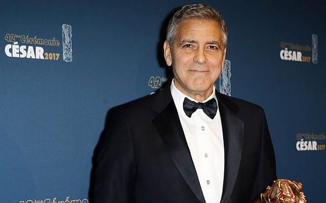 Actor George Clooney poses with the Honorary Cesar award during a photocall at the 42nd Cesar Film Awards ceremony at Salle Pleyel in Paris, February 24, 2017. This annual ceremony is presented by the French Academy of Cinema Arts and Techniques. (AP/Francois Mori) Actor George Clooney poses with the Honorary Cesar award during a photocall at the 42nd Cesar Film Awards ceremony at Salle Pleyel in Paris, February 24, 2017. This annual ceremony is presented by the French Academy of Cinema Arts and Techniques. (AP/Francois Mori)