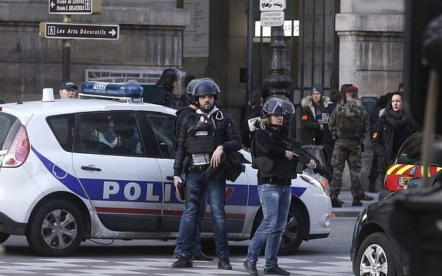 Police officers guard the access to the Louvre museum in Paris,Friday, Feb. 3, 2017. (AP Photo/Thibault Camus) Police officers guard the access to the Louvre museum in Paris,Friday, Feb. 3, 2017. (AP Photo/Thibault Camus)