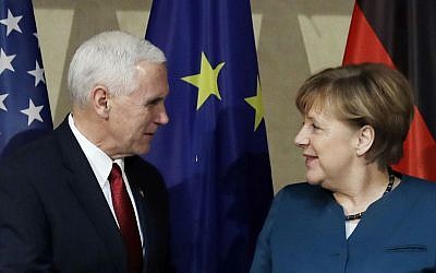 United States Vice President Mike Pence, left, and German Chancellor Angela Merkel meet for bilateral talks during the Munich Security Conference in Munich, Germany, Saturday, Feb. 18, 2017. (AP Photo/Matthias Schrader)