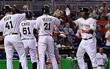 The Miami Marlins during a game against the Washington Nationals at Marlins Park in Miami, Fla., April 21, 2016. (Mike Ehrmann/Getty Images via JTA)