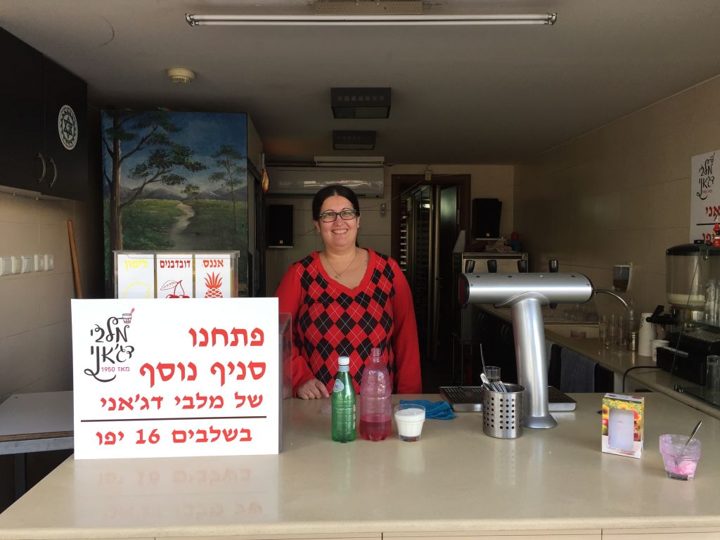 Sarit Levi, the third generation of her family to sell malabi at Dajani, their Jaffa storefront (Jessica Steinberg/Times of Israel) Sarit Levi, the third generation of her family to sell malabi at Dajani, their Jaffa storefront (Jessica Steinberg/Times of Israel)