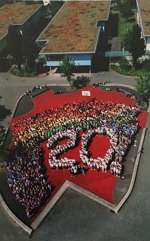 Students and faculty at Karla Raveh Gesamtschule in Lemgo, Germany celebrate the 20th anniversary of the school's naming in 2016 (Courtesy)