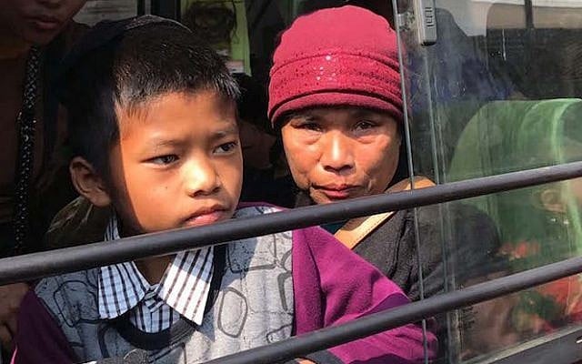 Members of the “Bnei Menashe” Jewish community in Aizawl, the capital of Mizoram, India, on their way to the airport, February 12, 2017. (Shavei Israel)