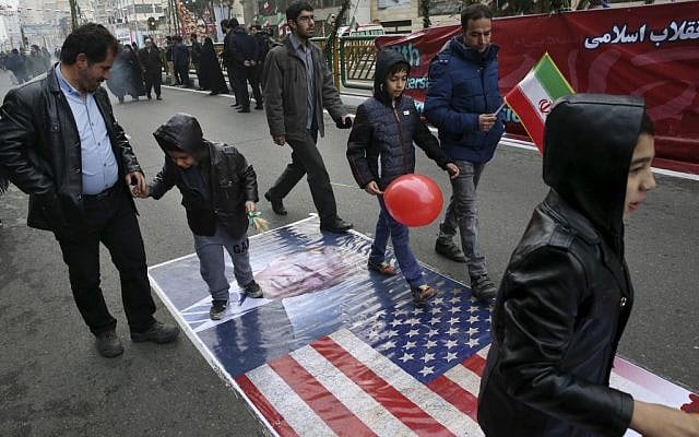 Iranians march on a portrait of U.S. President Donald Trump and the picture of U.S. flag in an annual rally commemorating the anniversary of the 1979 Islamic revolution, which toppled the late pro-US Shah, Mohammad Reza Pahlavi, in Tehran, Iran, Friday, Feb. 10, 2017. (Vahid Salemi/AP) Iranians march on a portrait of U.S. President Donald Trump and the picture of U.S. flag in an annual rally commemorating the anniversary of the 1979 Islamic revolution, which toppled the late pro-US Shah, Mohammad Reza Pahlavi, in Tehran, Iran, Friday, Feb. 10, 2017. (Vahid Salemi/AP)
