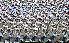 In this Sept. 21, 2016 file photo, Iranian armed forces members march in a military parade marking the 36th anniversary of Iraq's 1980 invasion of Iran, in front of the shrine of late revolutionary founder Ayatollah Khomeini, just outside Tehran, Iran. (AP Photo/Ebrahim Noroozi, File)