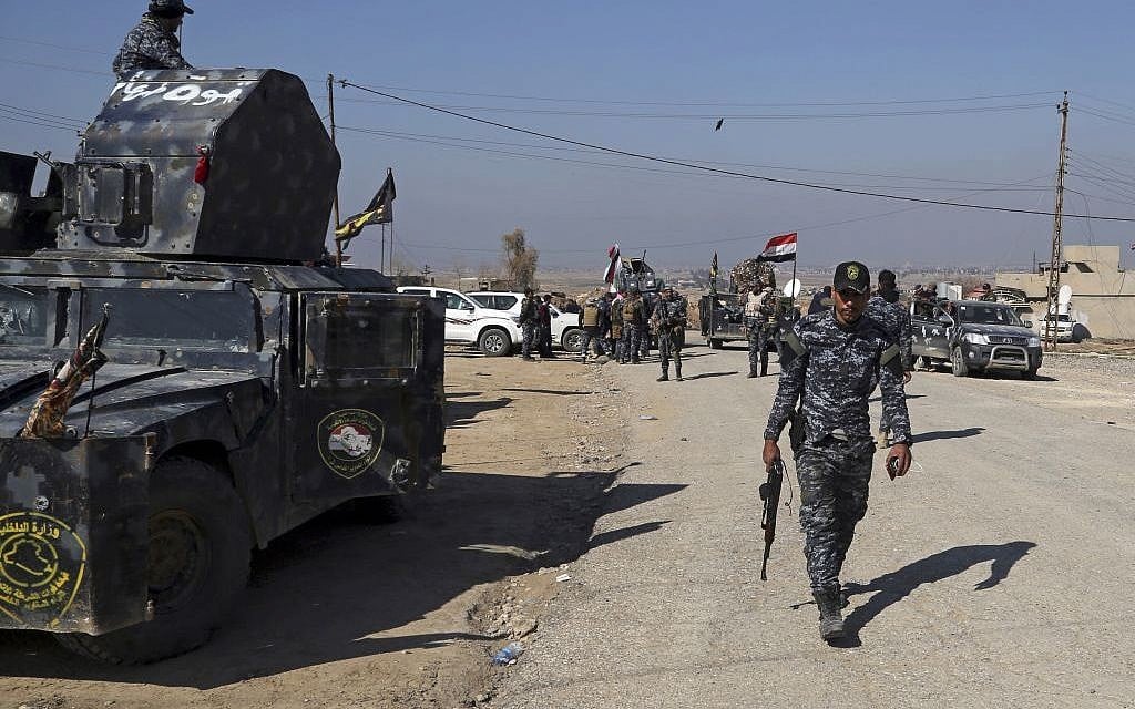 Iraqi Federal police deploy after regaining control of the town of Abu Saif, west of Mosul, Iraq, February 22, 2017. (AP Photo/Khalid Mohammed)