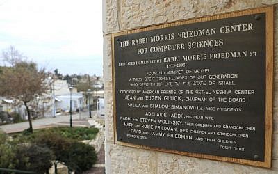 A writing at the women's seminary building donated by US ambassador to Israel designate David Friedman is seen in the West Bank settlement of Beit El near Ramallah Thursday, Feb. 16, 2017. (AP Photo/Tsafrir Abayov)