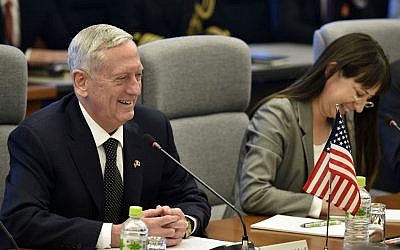 US Defense Secretary Jim Mattis, left, smiles while speaking to Japanese Defense Minister Tomomi Inada, unseen, at the start of their meeting at Defense Ministry in Tokyo, Saturday, Feb. 4, 2017. (Franck Robichon/Pool Photo via AP)