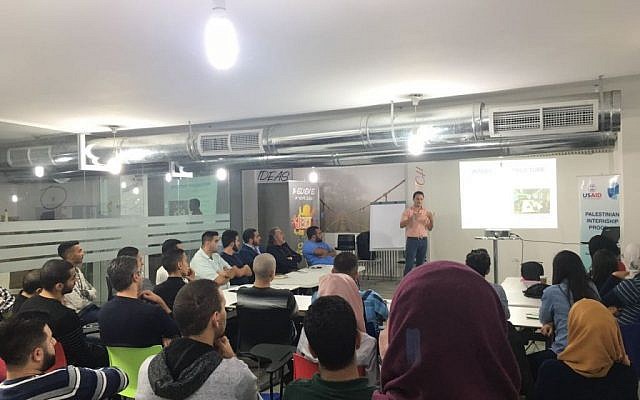 PIP program coordinator Jesse Divon speaks to prospective applicants in Jerusalem on November 14th, 2016. (Courtesy) 