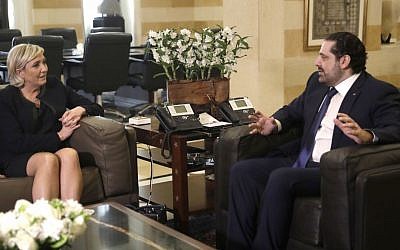 Lebanese prime minister Saad Hariri, right, meets with far right leader and presidential candidate Marine Le Pen, left, at the government palace, in Beirut, Lebanon, Monday, Feb. 20, 2017. (AP Photo/Hussein Malla)