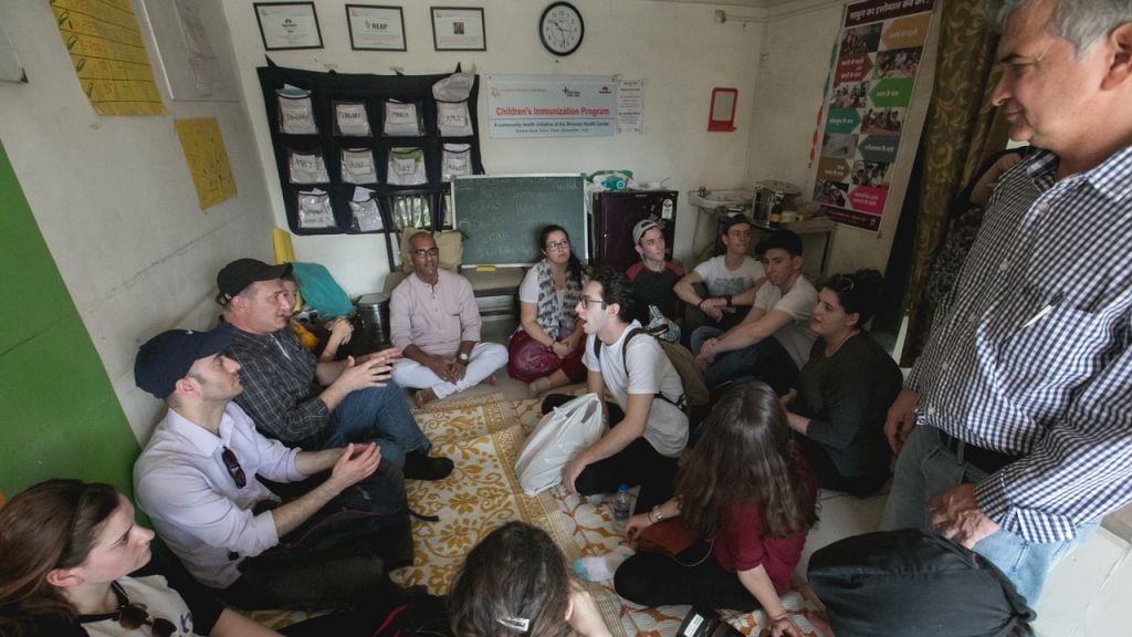 Group debriefing in the Kalwa slum, with Jacob Stockman, founder and director of the Gabriel Project Mumbai. (Courtesy) Group debriefing in the Kalwa slum, with Jacob Stockman, founder and director of the Gabriel Project Mumbai. (Courtesy)