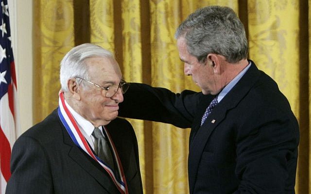 This Feb. 13, 2006 file photo shows then-US president George W. Bush, right, presenting the National Medal of Science to Dr. Kenneth J. Arrow, left, from Stanford University, during a ceremony in the East Room of the White House in Washington. (AP Photo/Pablo Martinez Monsivais, File) This Feb. 13, 2006 file photo shows then-US president George W. Bush, right, presenting the National Medal of Science to Dr. Kenneth J. Arrow, left, from Stanford University, during a ceremony in the East Room of the White House in Washington. (AP Photo/Pablo Martinez Monsivais, File)