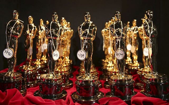 This March 2, 2014 file photo shows Oscar statues lined up backstage during the Oscars in Los Angeles. (Matt Sayles/Invision/AP, File) This March 2, 2014 file photo shows Oscar statues lined up backstage during the Oscars in Los Angeles. (Matt Sayles/Invision/AP, File)