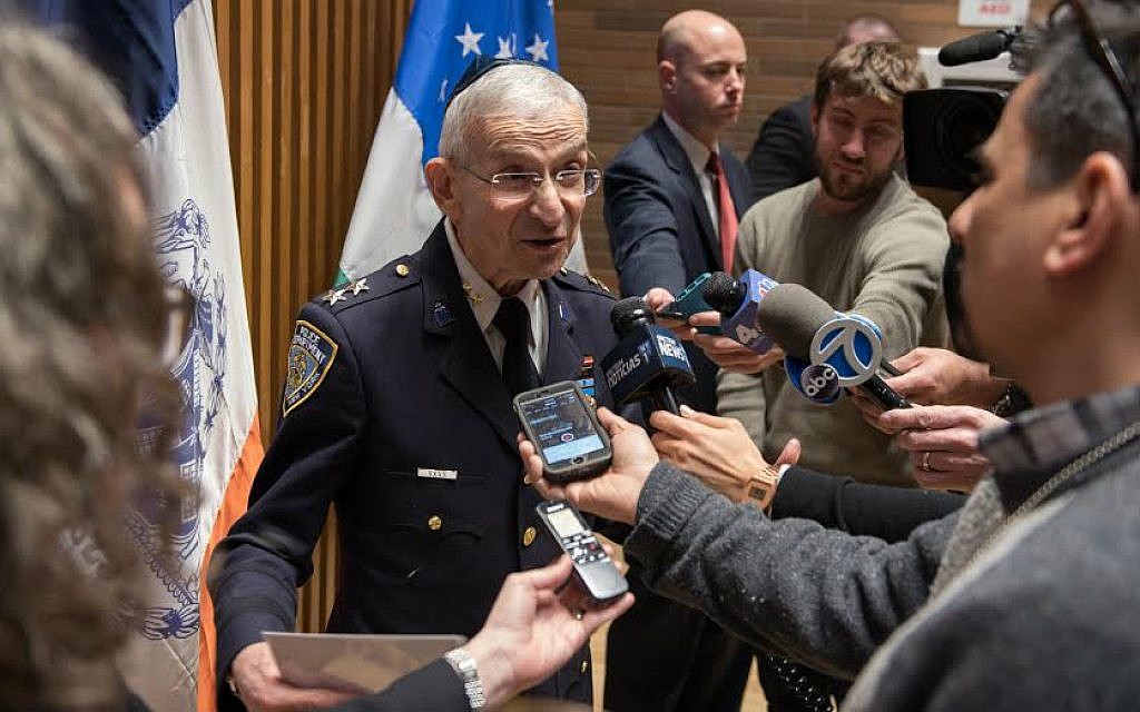 Rabbi Alvin Kass addressing members of the press. (Courtesy Lt. Steven A. Jerome)