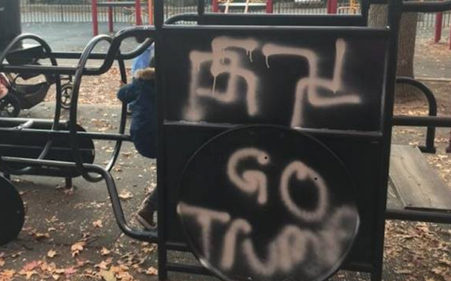 A children’s playground in Brooklyn Heights, New York was vandalized with a swastika in November 2016. (Screenshot from Twitter via JTA)