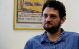 Times of Israel deputy editor Joshua Davidovich speaks at the Times of Israel office in Jerusalem. (Dennis Zinn)