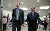 Sen. Ron Wyden, D-Oregon, left, and Sen. Roy Blunt, R-Missouri, walk to a closed intelligence briefing with FBI Director James Comey, Friday, Feb. 17, 2017, on Capitol Hill in Washington. (AP Photo/J. Scott Applewhite)