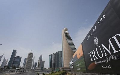 A giant billboard advertising the Trump International Golf Club hangs at the Dubai Trade Center roundabout, in Dubai, United Arab Emirates on February 18, 2017. (AP Photo/Kamran Jebreili)