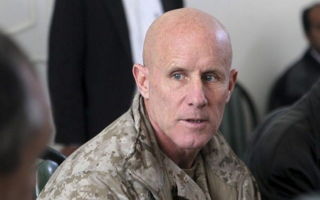 In this image provided by the US Marine Corps, Vice Adm. Robert S. Harward, commanding officer of Combined Joint Interagency Task Force 435, speaks to an Afghan official during his visit to Zaranj, Afghanistan, Jan. 6, 2011. (Sgt. Shawn Coolman/US Marine Corps via AP)