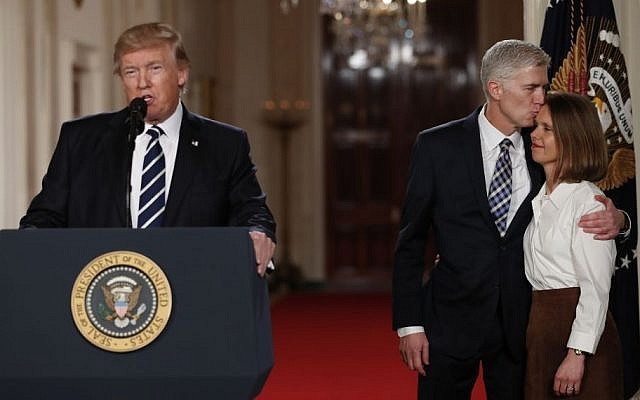 US President Donald Trump speaks in the East Room of the White House in Washington, Tuesday, Jan. 31, 2017, to announce Judge Neil Gorsuch as his nominee for the Supreme Court. Gorsuch stands with his wife Louise. (AP Photo/Carolyn Kaster) US President Donald Trump speaks in the East Room of the White House in Washington, Tuesday, Jan. 31, 2017, to announce Judge Neil Gorsuch as his nominee for the Supreme Court. Gorsuch stands with his wife Louise. (AP Photo/Carolyn Kaster)