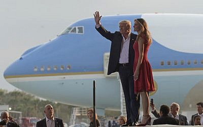 US president Donald Trump and first lady Melania Trump arrive for the "Make America Great Again Rally" at Orlando-Melbourne International Airport in Melbourne, Fla., Saturday, Feb. 18, 2017. (Susan Walsh/AP)