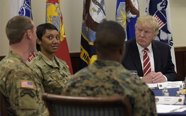 President Donald Trump has lunch with troops while visiting US Central Command and US Special Operations Command at MacDill Air Force Base, Fla., Monday, Feb. 6, 2017. (AP Photo/Susan Walsh)