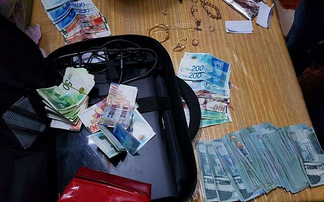 Money given by Hamas to families of terrorists in Jerusalem, confiscated in police raid on February 6, 2017 (Police spokesperson) Money given by Hamas to families of terrorists in Jerusalem, confiscated in police raid on February 6, 2017 (Police spokesperson)