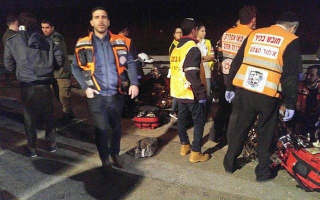 Rescue personnel attend the scene of a car-ramming attack in the West Bank that left three people wounded on February 2, 2017 (Photo: United Hatzala)