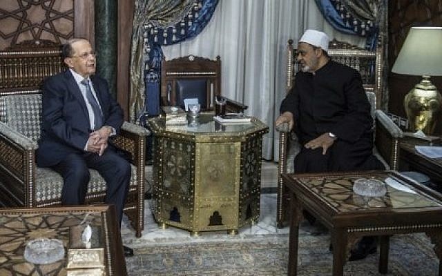 Egypt's Grand Imam of al-Azhar Sheikh Ahmed Mohamed al-Tayeb (R) receives Lebanese President Michel Aoun at his office in Cairo on February 13, 2017. / AFP PHOTO / KHALED DESOUKI Egypt's Grand Imam of al-Azhar Sheikh Ahmed Mohamed al-Tayeb (R) receives Lebanese President Michel Aoun at his office in Cairo on February 13, 2017. / AFP PHOTO / KHALED DESOUKI