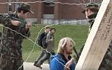 Illustrative: Students at the UK‘s Sussex University staging a mock Israeli checkpoint during Israel Apartheid Week, March, 2012. (screen capture: YouTube/File)