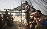 Illustrative: Bedouin IDF soldiers in a tent they set up in a field near the Gaza border in southern Israel, on July 6, 2014. (Hadas Parush/Flash90)