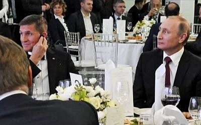 flynn putin Former US National Security Advisor Michael Flynn (L) alongside Russian President Vladimir Putin at a dinner event celebrating Russian TV network RT's 10th anniversary in Moscow, Russia. (Screen capture/YouTube)