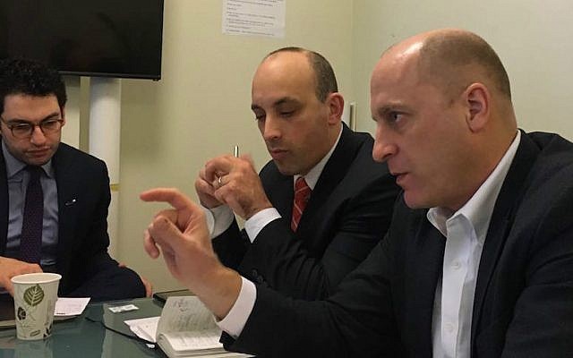 Gidi Grinstein, right, and ADL CEO Jonathan Greenblatt, center, in the Jewish Telegraphic Agency office in New York, Feb. 2, 2017. (Courtesy of Reut)