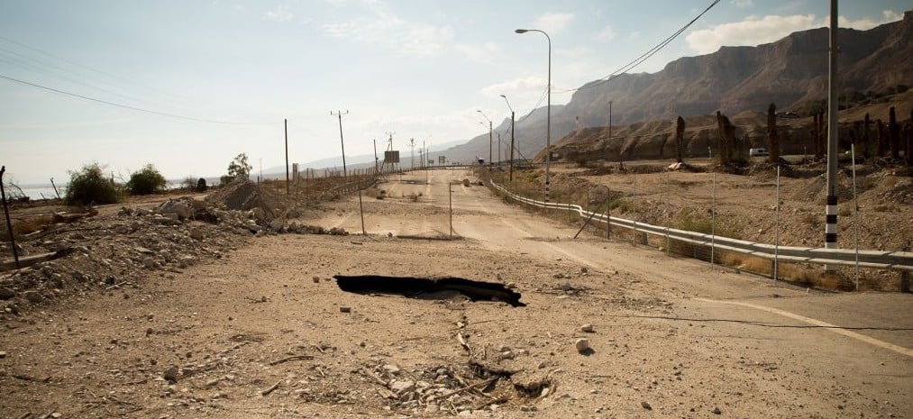 In 2015, sinkholes forced the closure of this part of Highway 90, pictured here on January 6, 2016. Now drivers must take a winding bypass which is very close to the Ein Gedi nature reserve. In 2015, sinkholes forced the closure of this part of Highway 90, pictured here on January 6, 2016. Now drivers must take a winding bypass which is very close to the Ein Gedi nature reserve. (Luke Tress/Times of Israel)