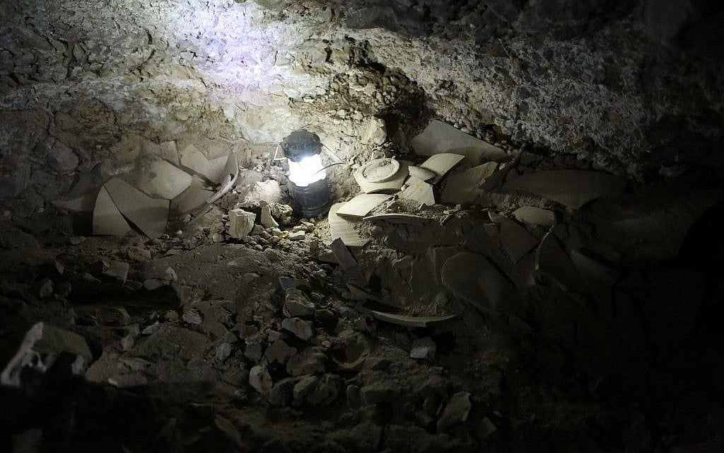 Fragments of shattered jars believed to have contained stolen Dead Sea scrolls, found in Cave 53 near Qumran. (Casey L. Olson and Oren Gutfeld, Hebrew University)